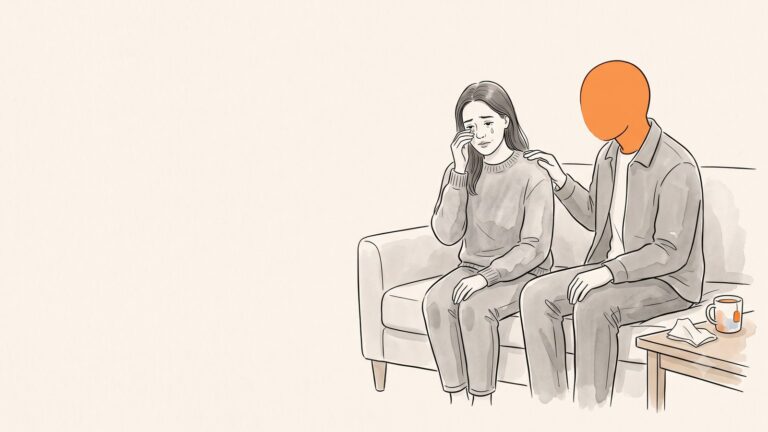 Period crying: a partner sits close with a steadying hand on her shoulder as she wipes away tears before her period