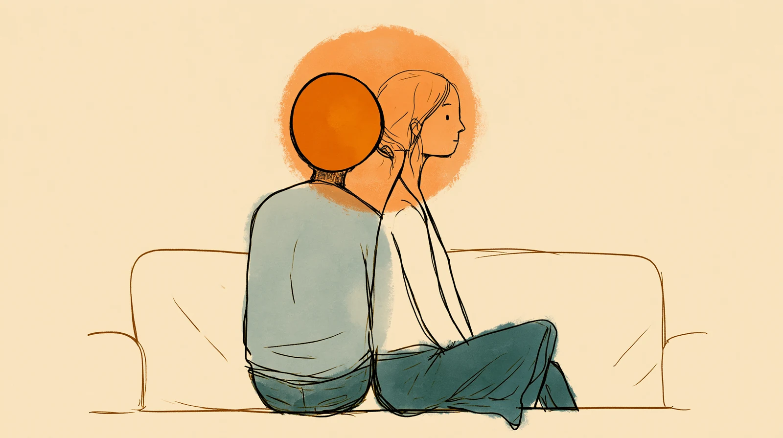A partner sitting calmly beside his girlfriend, present without trying to fix her period pain