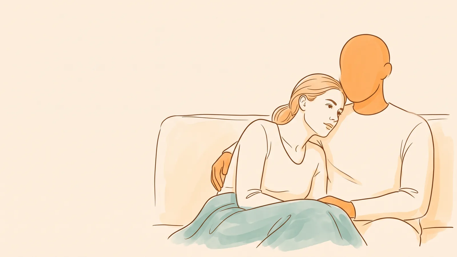 A couple resting together on a couch, steady through a PMDD relationship long term