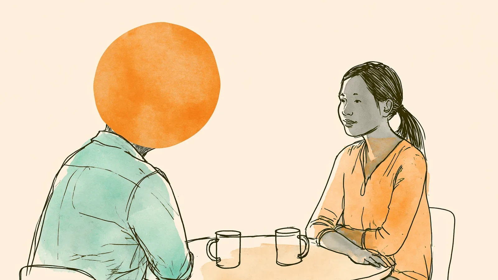 Dad and teenage daughter talking at the kitchen table - how to help daughter with period cramps