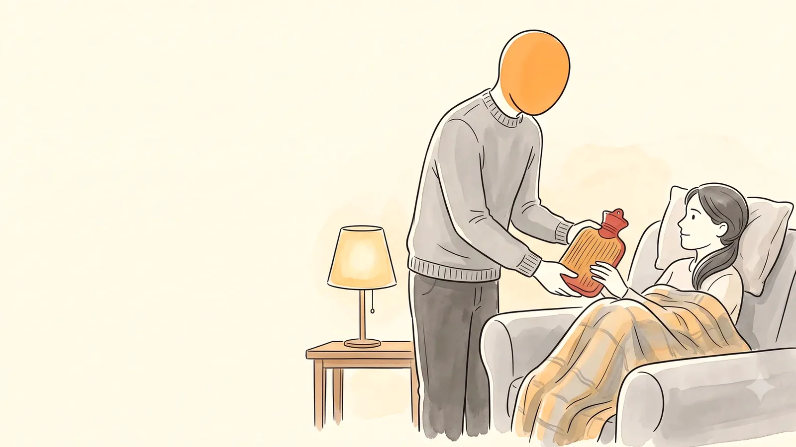 How to help with period cramps: a partner brings a hot water bottle to her on the couch