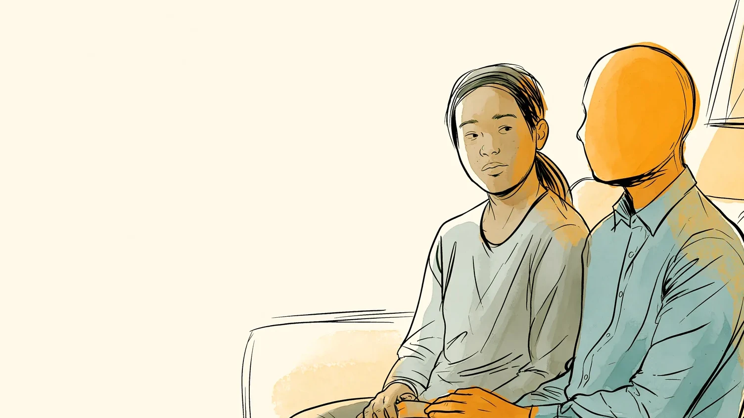 IUD insertion what to expect: a couple talking on the couch after the appointment